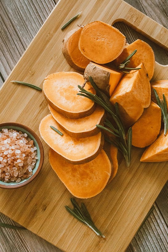 A holiday recipe prepped by Jen Meijer with cut of vegetables on a wooden cutting board