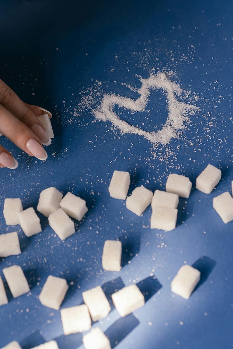Sweetener cubes on a blue background